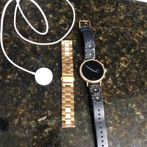 Fossil smart watch rose gold with leather band.